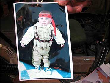 Outrage Over 'Baby Bomber' Pic - CBS News