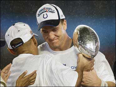 Manning, Colts reign in wet, soggy Super Bowl