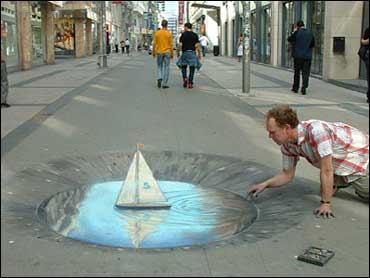 Watch How This Chalk Artist Creates Illusions on Pavement