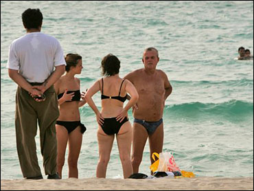 Crackdown On Topless Bathing In Dubai - CBS News