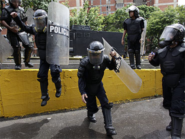 Police, Protesters Clash In Venezuela - CBS News