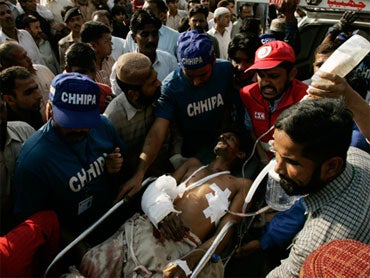 Pakistan Bombs Target Shiite Worshippers - CBS News