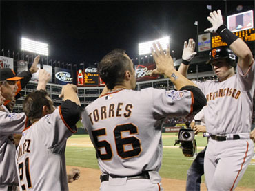 San Francisco Giants second baseman Freddy Sanchez gets the out on Texas  Rangers left fielder Josh Hamilton to end the fourth inning of Game 4 of  the World Series on Sunday. (Michael