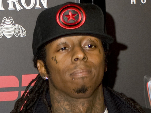 Lil Wayne Goes Green and Yellow: Do Lyrics Lead To Super Bowl Gold