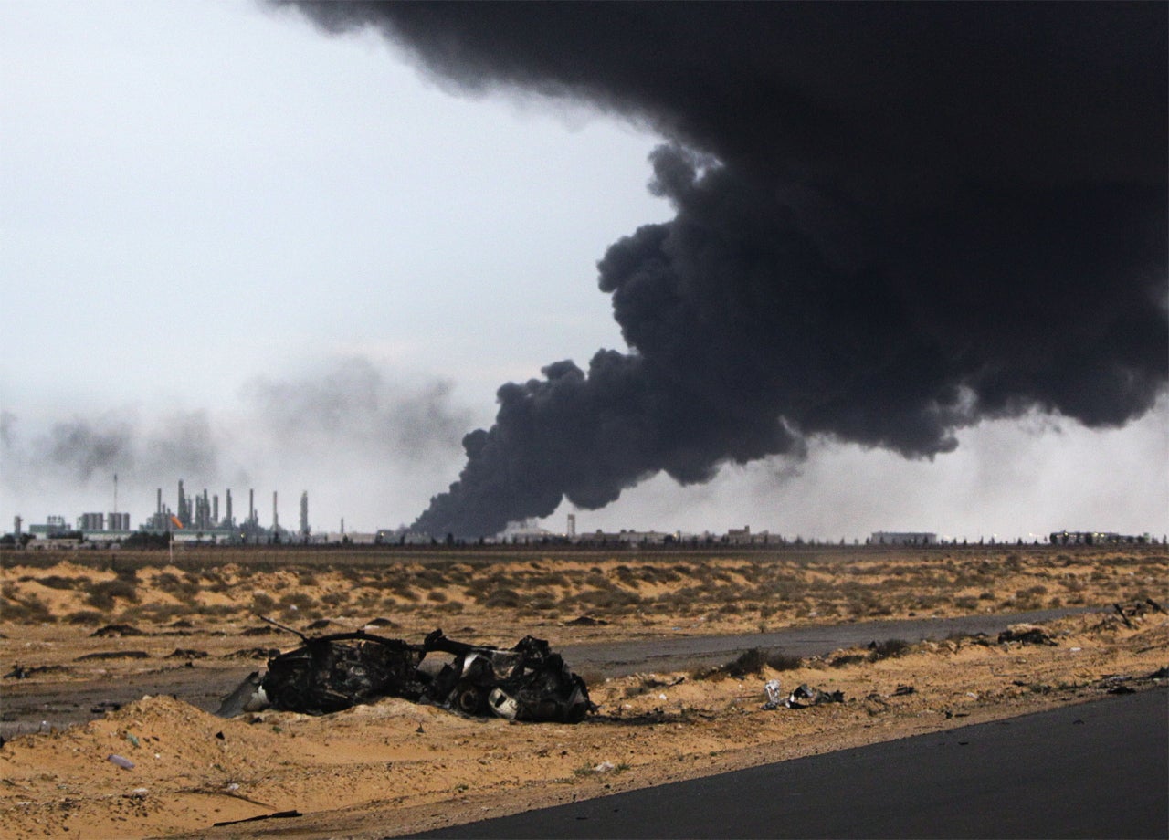 Oil prices tumble as Libya declares cease-fire - CBS News