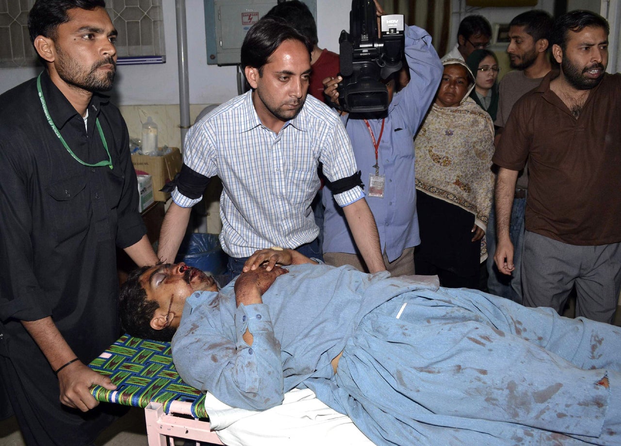 At least 40 killed in attack at Pakistan shrine - CBS News