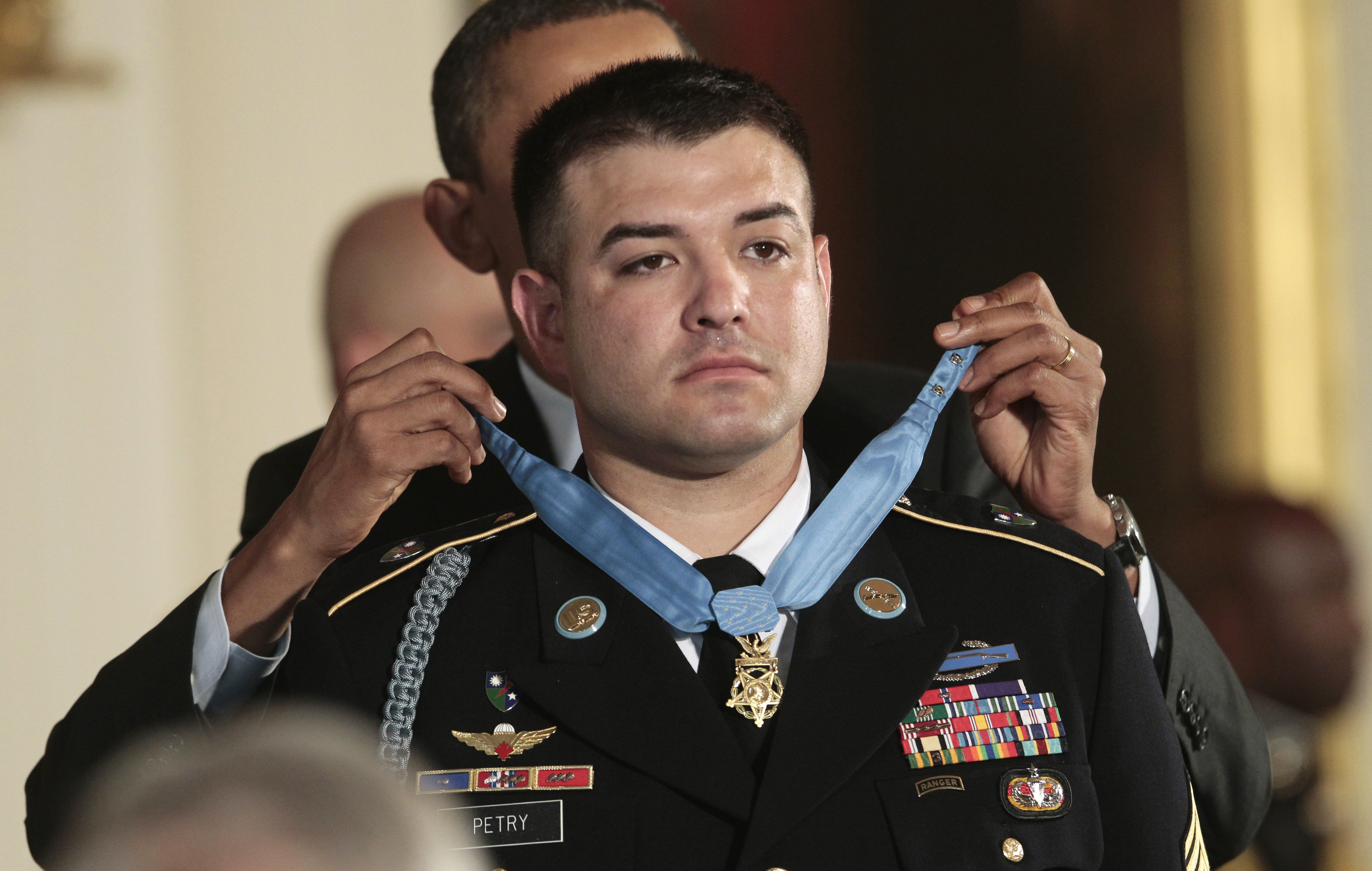 Sergeant First Class Leroy Arthur Petry, U.S. Army, waits to receive his  Medal of Honor from U.S. President Barack Obama for his heroic actions in  Afghanistan in May, 2008, during a ceremony