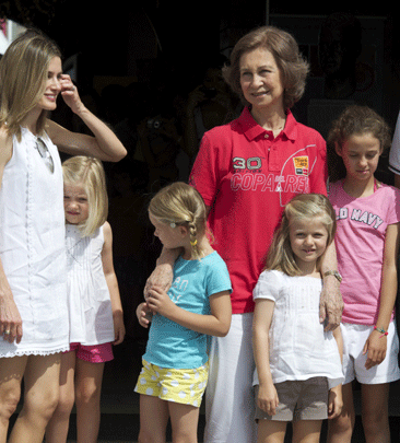 Spain's Queen Sofia, center, poses with her grandchildren and  her daughter-in law, Princess Letizia, left, the Palma de Mallorca Nautic Club on Aug.2, 2011. 
