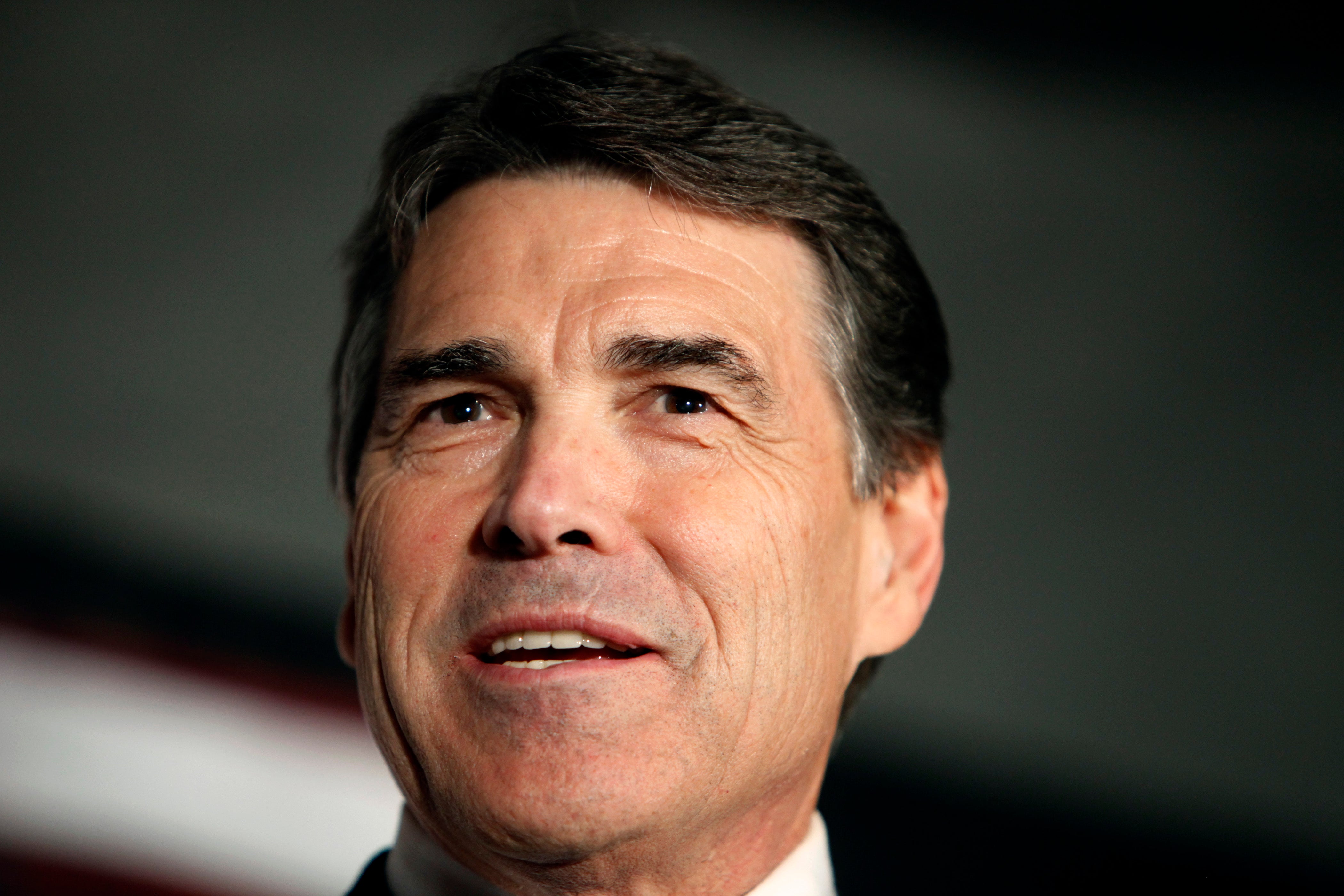 Perry campaign backs away from call to repeal 16th Amendment - CBS News