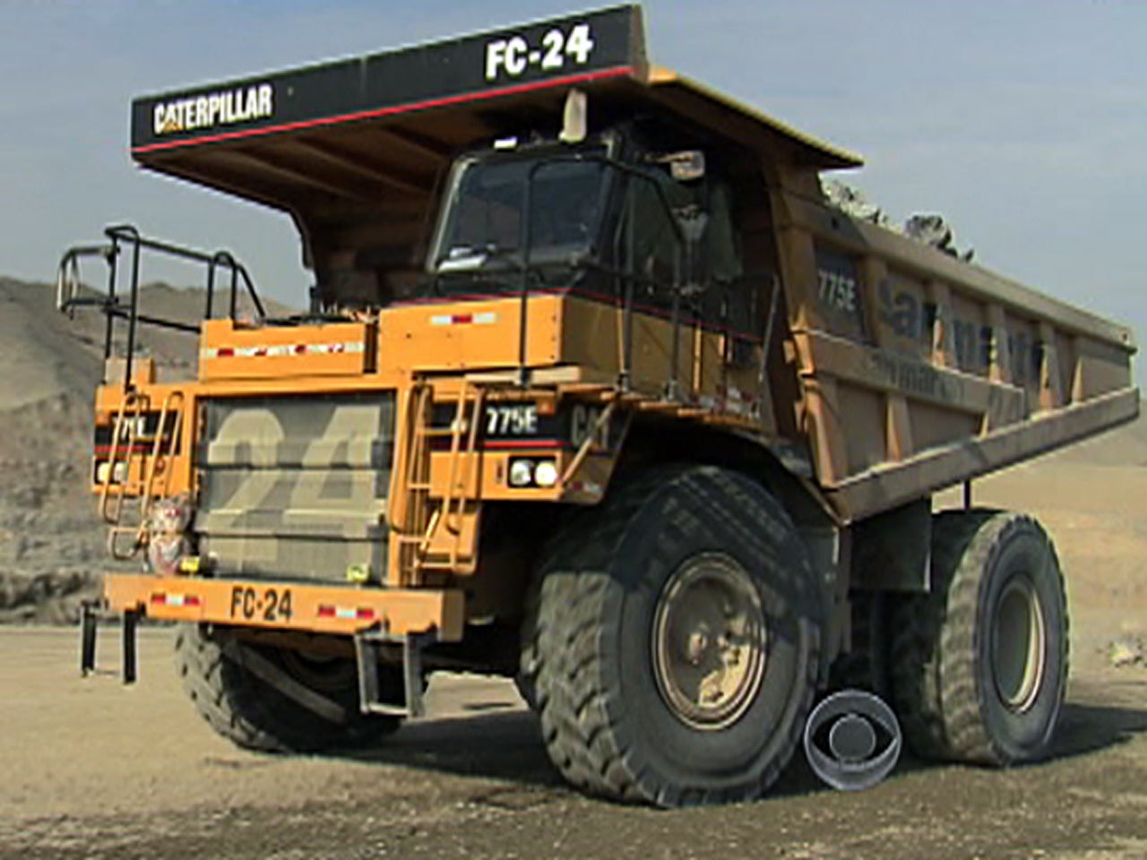 Caterpillar profit jumps 29 pct, boosts outlook CBS News