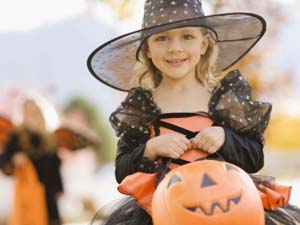 Halloween Vertical - Halloween Classics - girl in witch hat trick or treating 