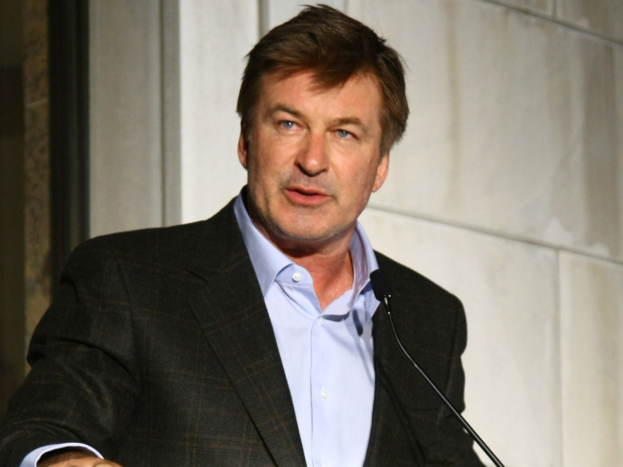 Rude' Alec Baldwin fled to toilet, booted from plane