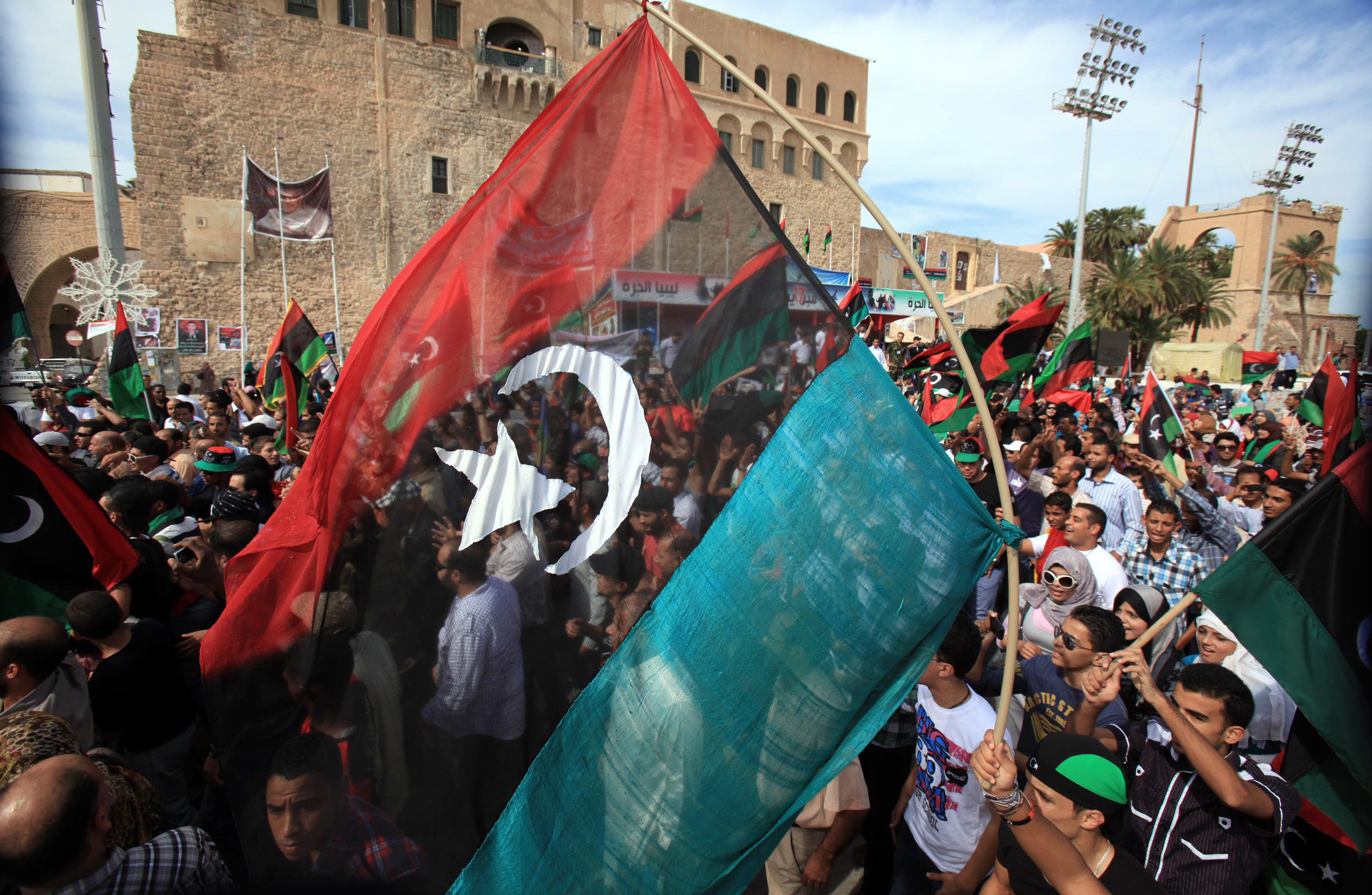 Libyans Wave New National Flag 