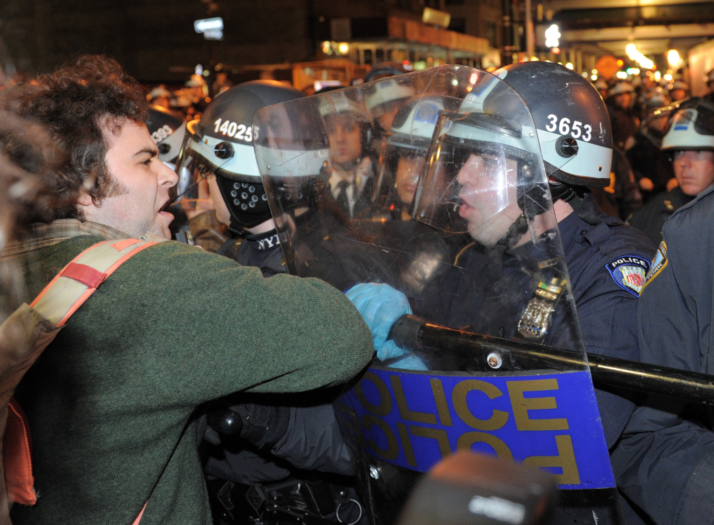 A man is confronted by NYPD in Zuccotti Park 