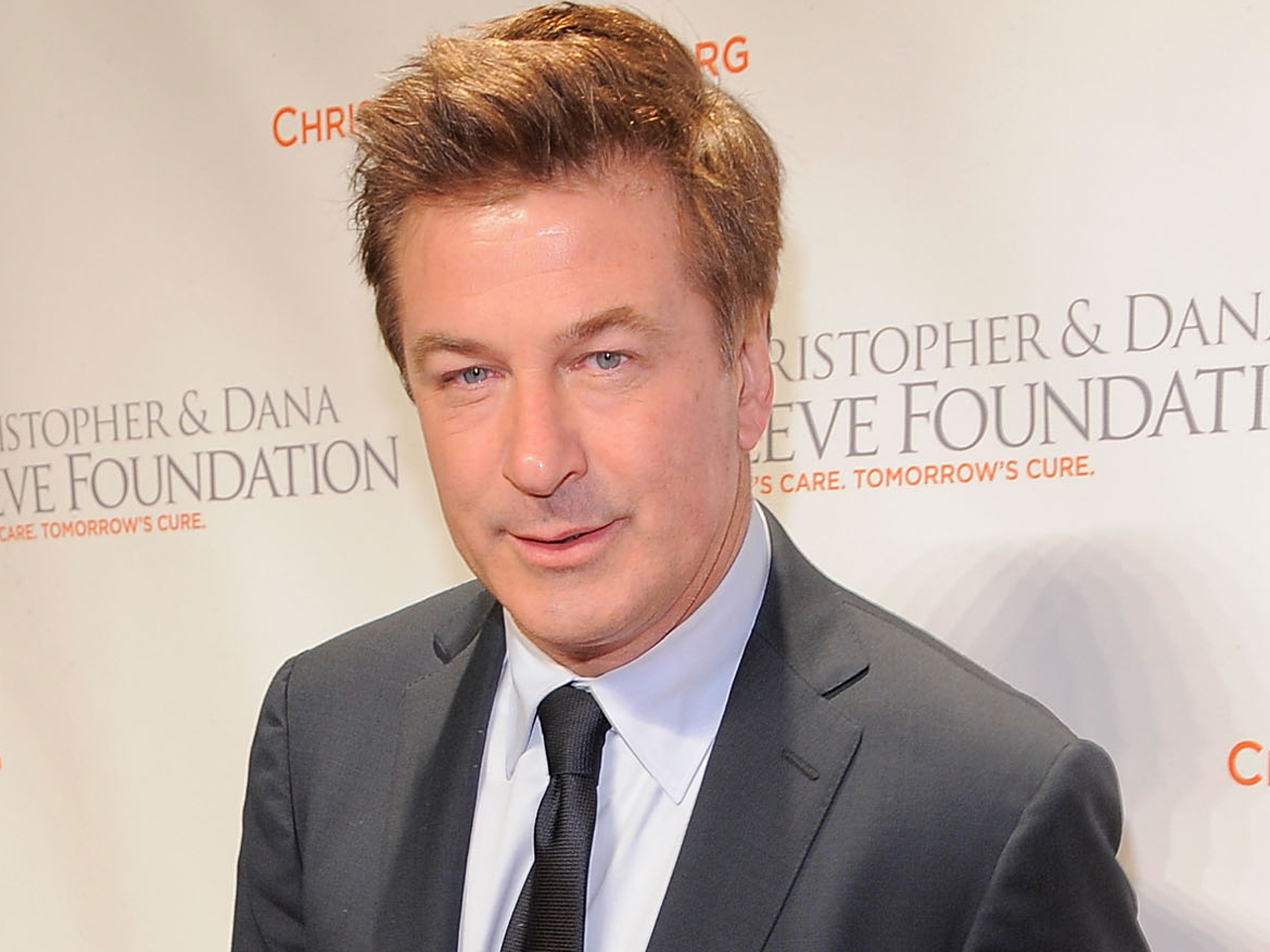 Rude' Alec Baldwin fled to toilet, booted from plane