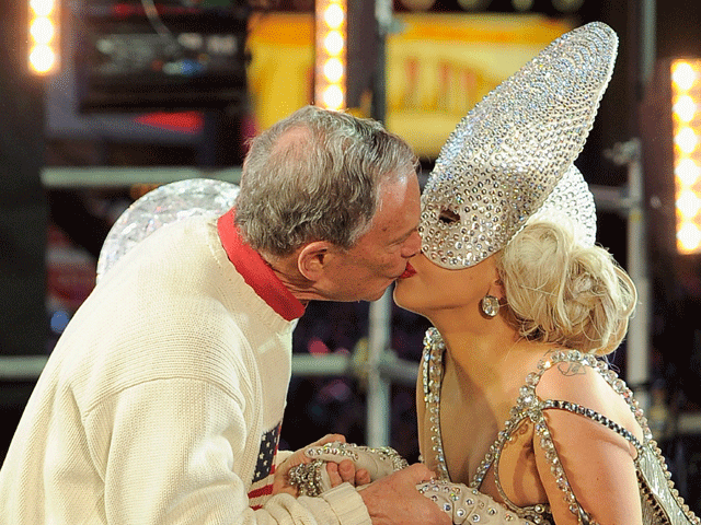 Lady Gaga and New York Mayor Michael Bloomberg share a kiss as they celebrate the beginning of 2012 in  New York's Times Square. 