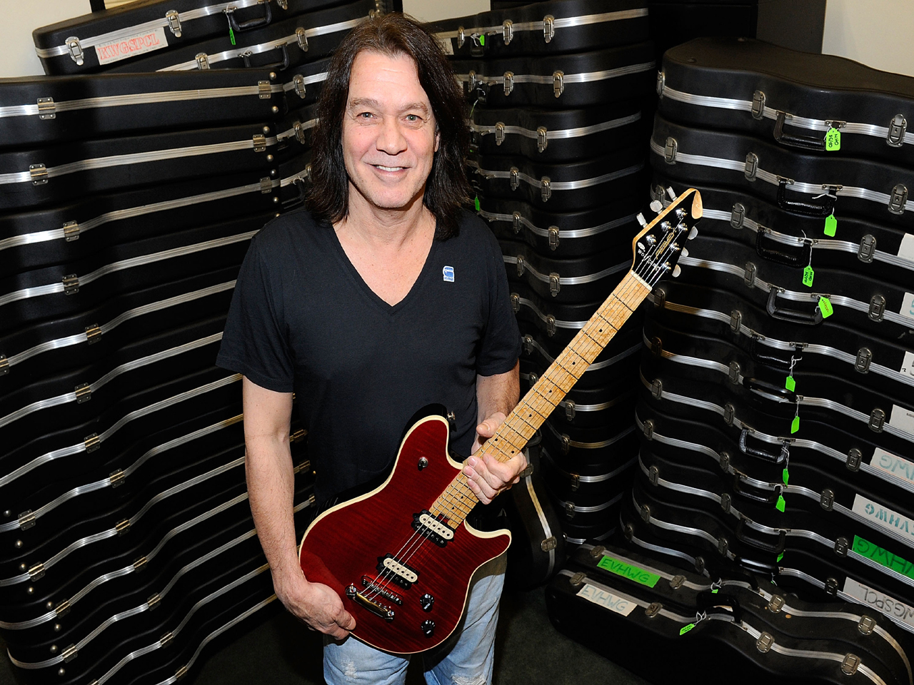 Eddie Van Halen donates guitars to schools - CBS News