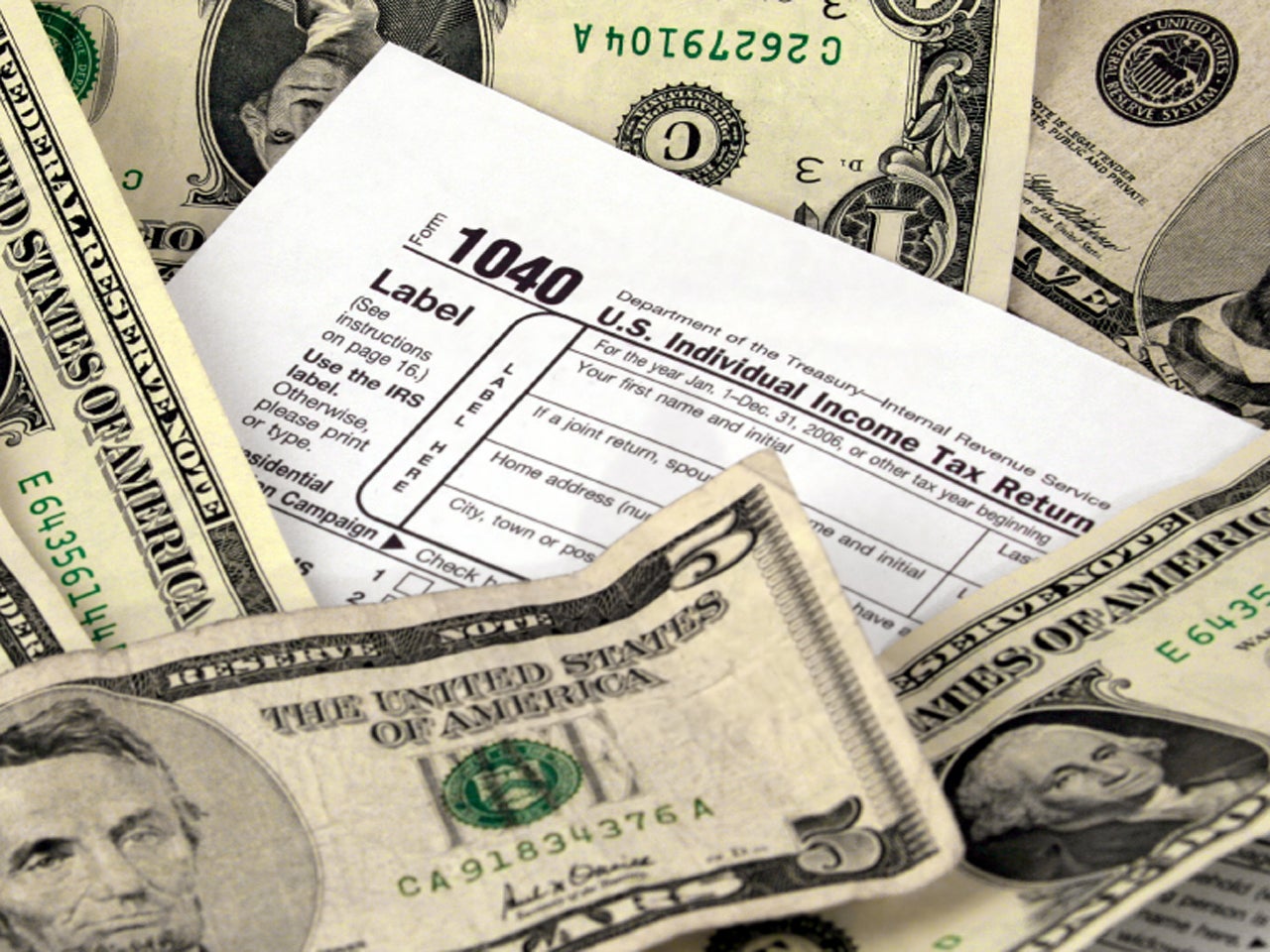 Why you shouldn't pay your taxes with a debit card - CBS News
