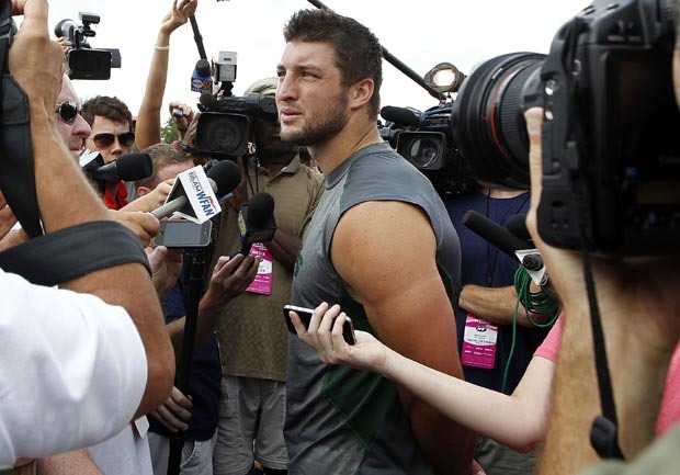 Tim Tebow balancing faith, fame and football with Jets