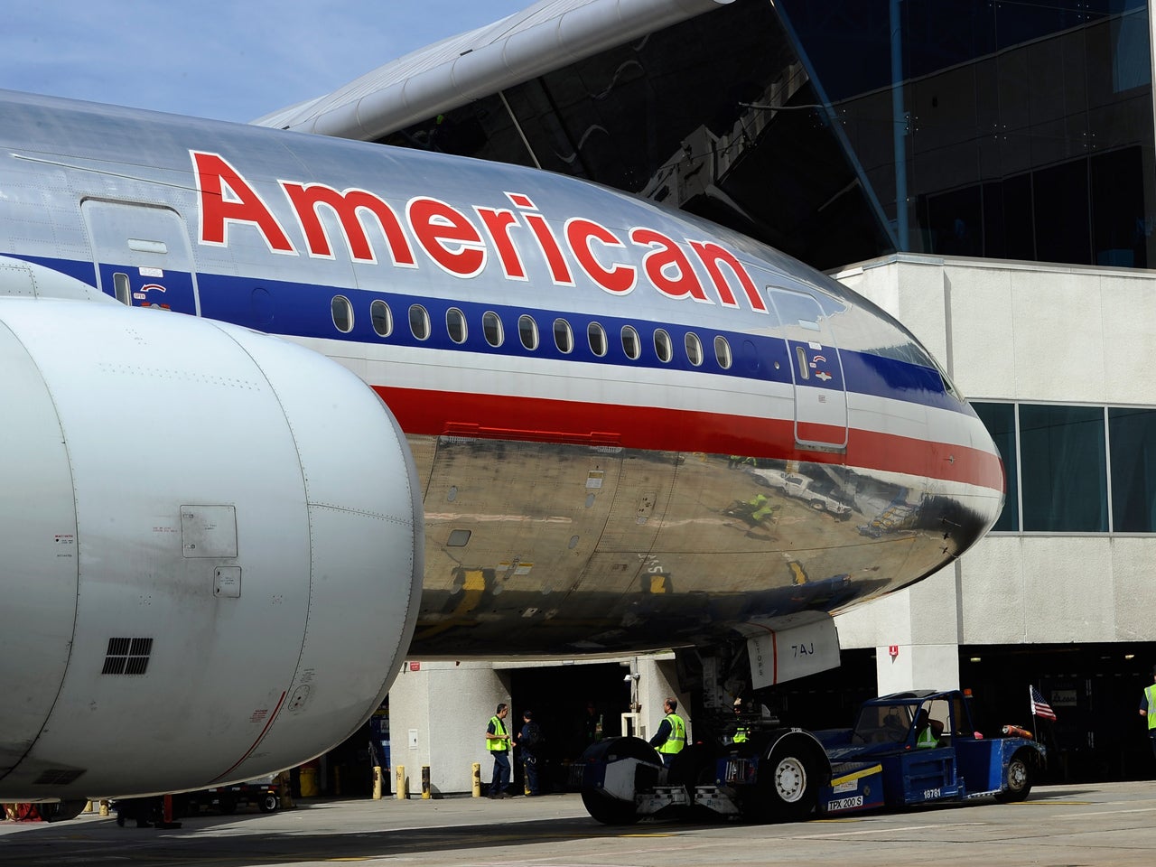 American Airlines parent reports loss of 238M CBS News