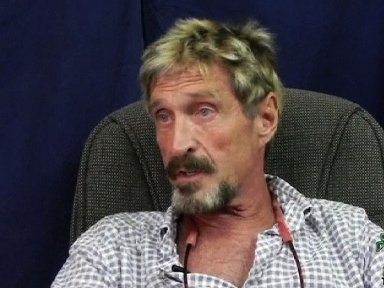John Mcafee Says He Wont Turn Himself In For Questioning Over Neighbors Murder In Belize Cbs 