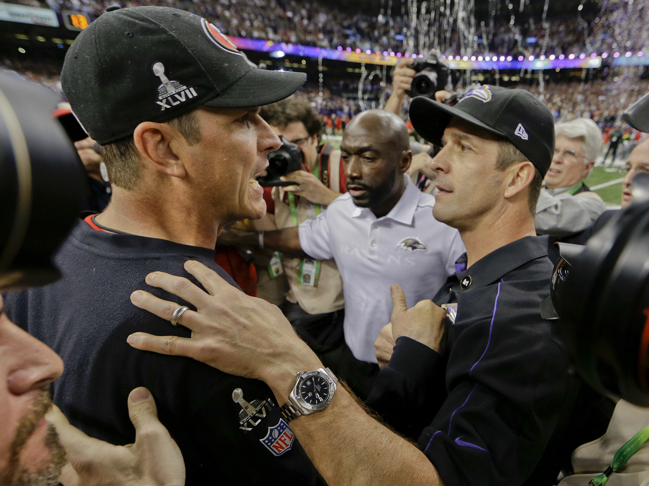 Baltimore Ravens head coach John Harbaugh clocks long hours to