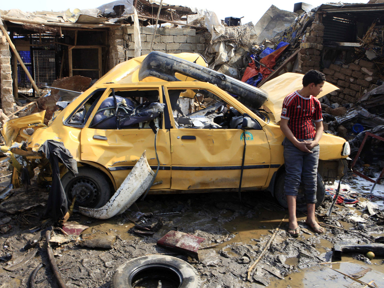 Iraq bomb blasts kill at least 36 on market day - CBS News