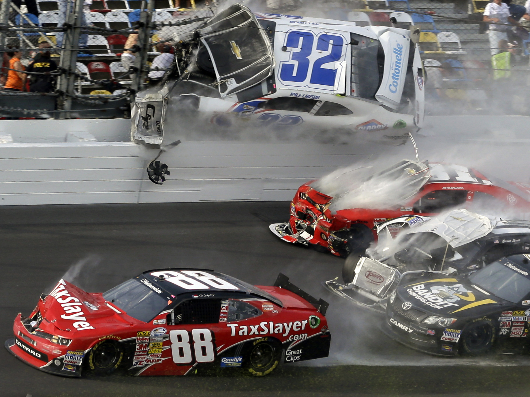 Daytona crash sends car parts flying, injuring fans