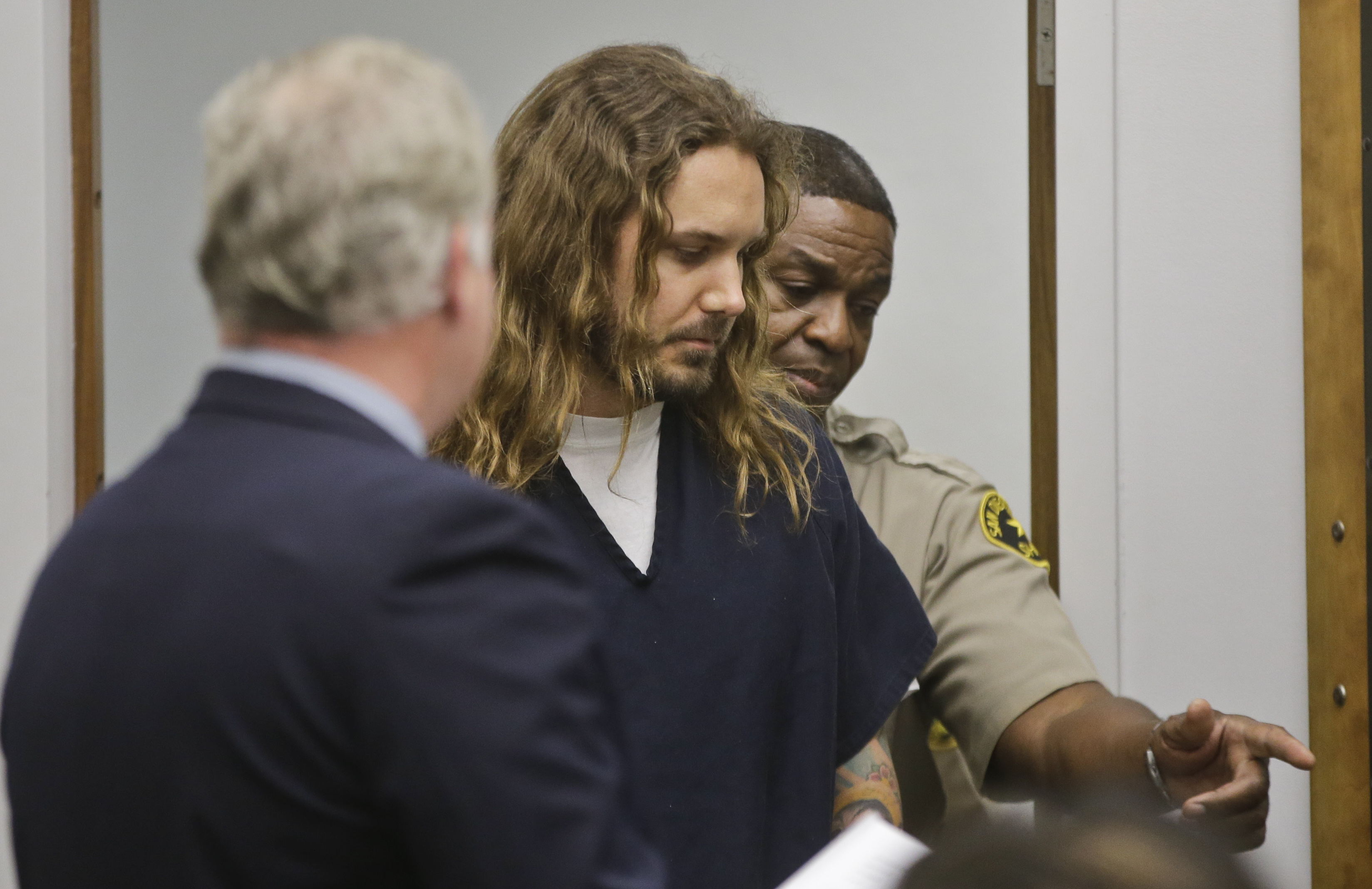 as-i-lay-dying-singer-charged-with-soliciting-wife-s-murder-cbs-news