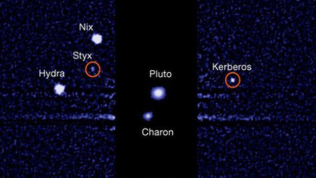 Pluto's smallest moons finally have names - CBS News