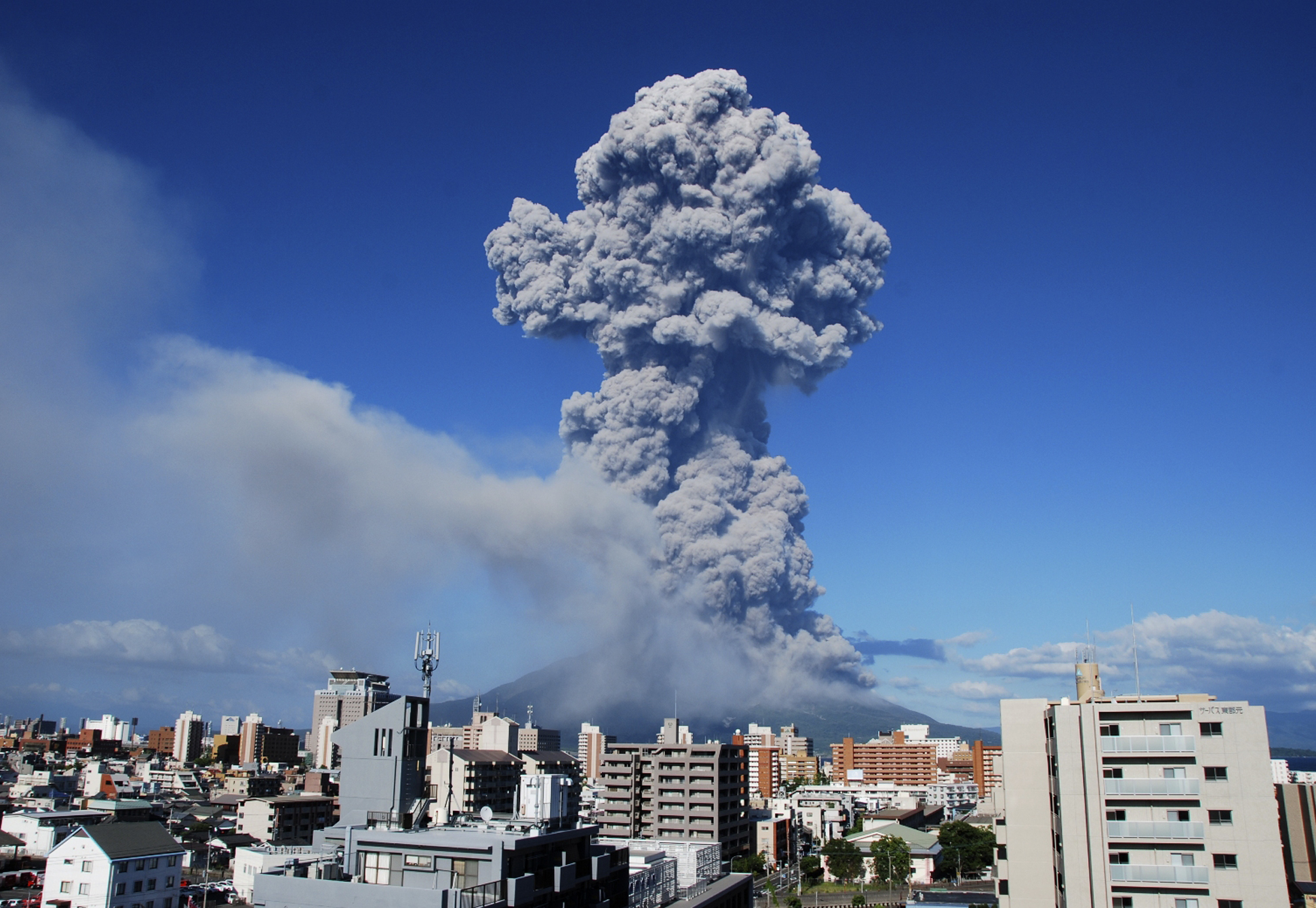 Japanese city coated with ash from volcanic eruption CBS News