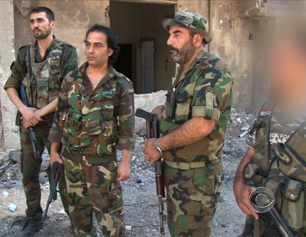 Inside view of militias fighting for the Syrian regime - CBS News