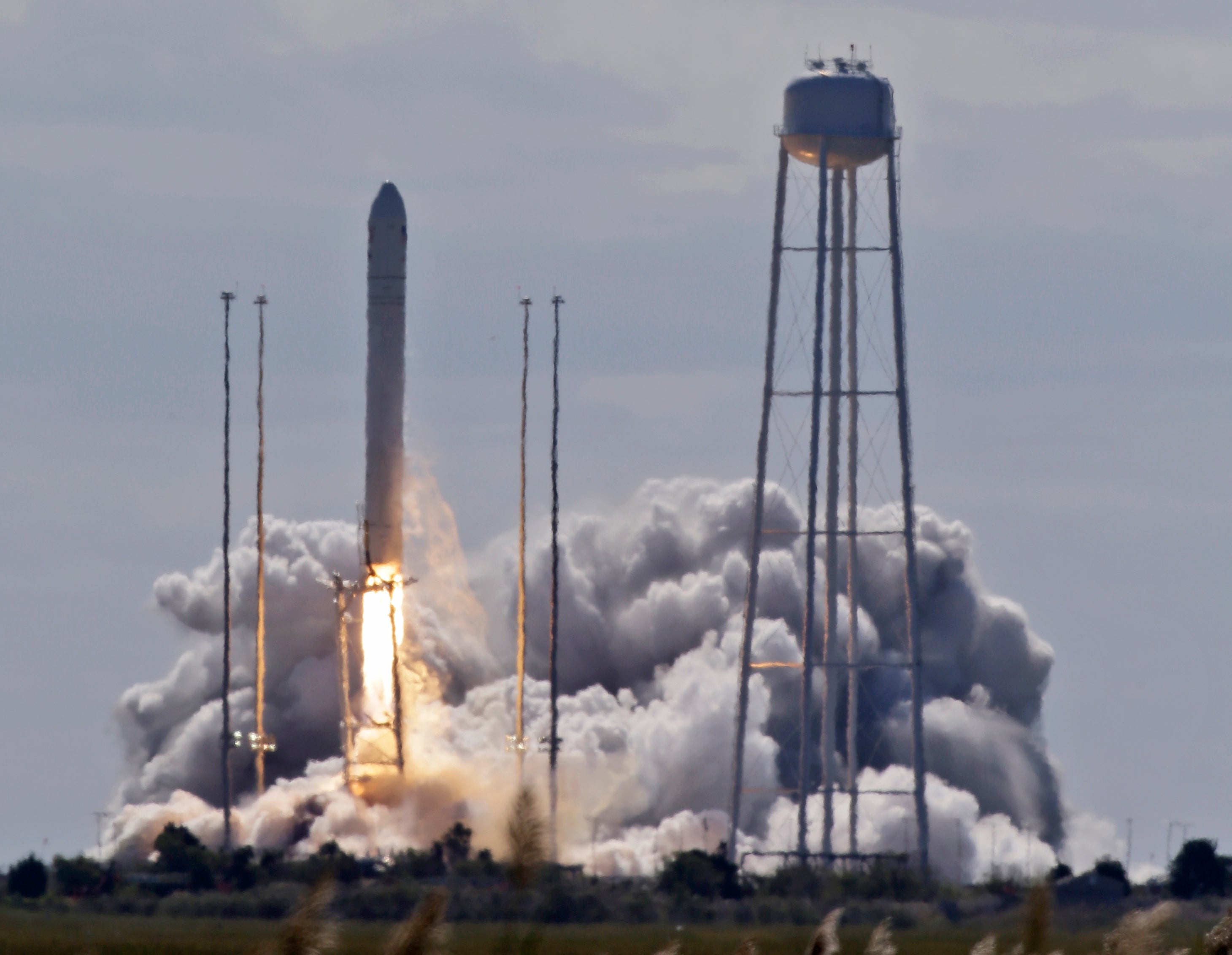 Orbital launches cargo ship on maiden flight to space station - CBS News