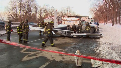 Small plane makes emergency landing on New York City highway - CBS News
