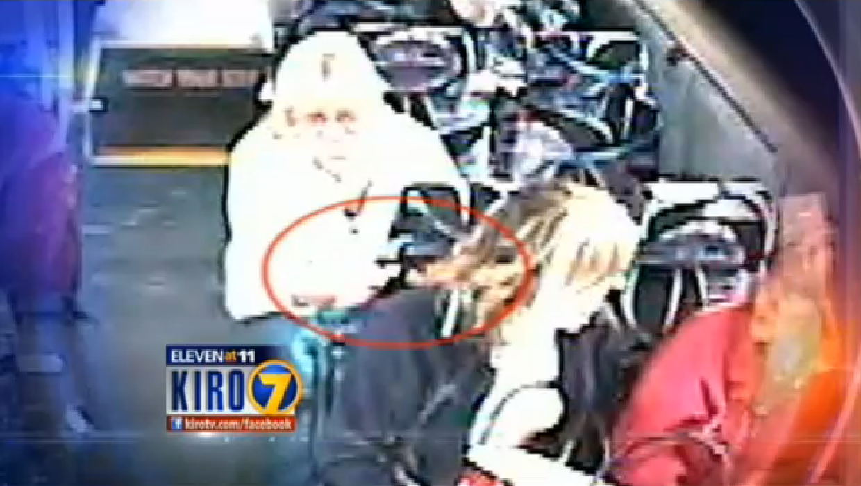 VIDEO Woman lights bus passenger's hair on fire CBS News