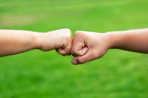 Fist bump, handshake, high-five: Which spreads the most germs? - CBS News