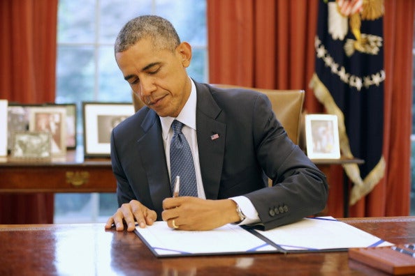 Obama Signs Bill Unlocking Cell Phones CBS News   453034628 