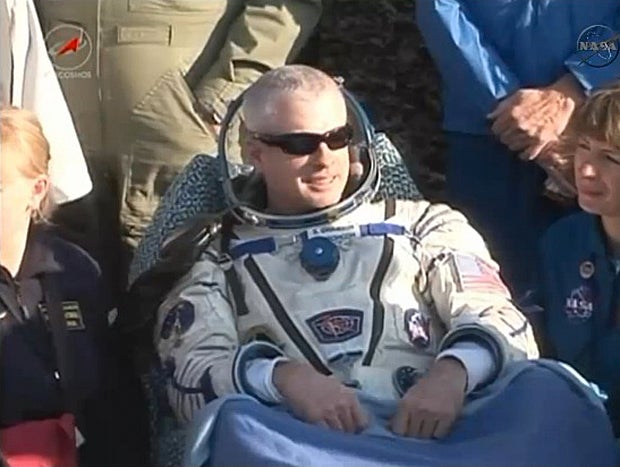 Space station trio returns to Earth after 169 days - CBS News