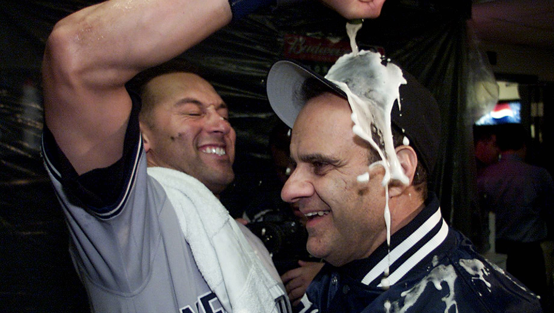 BRONX, NY - SEPTEMBER 09: Derek Jeter fist bumps Joe Torre during