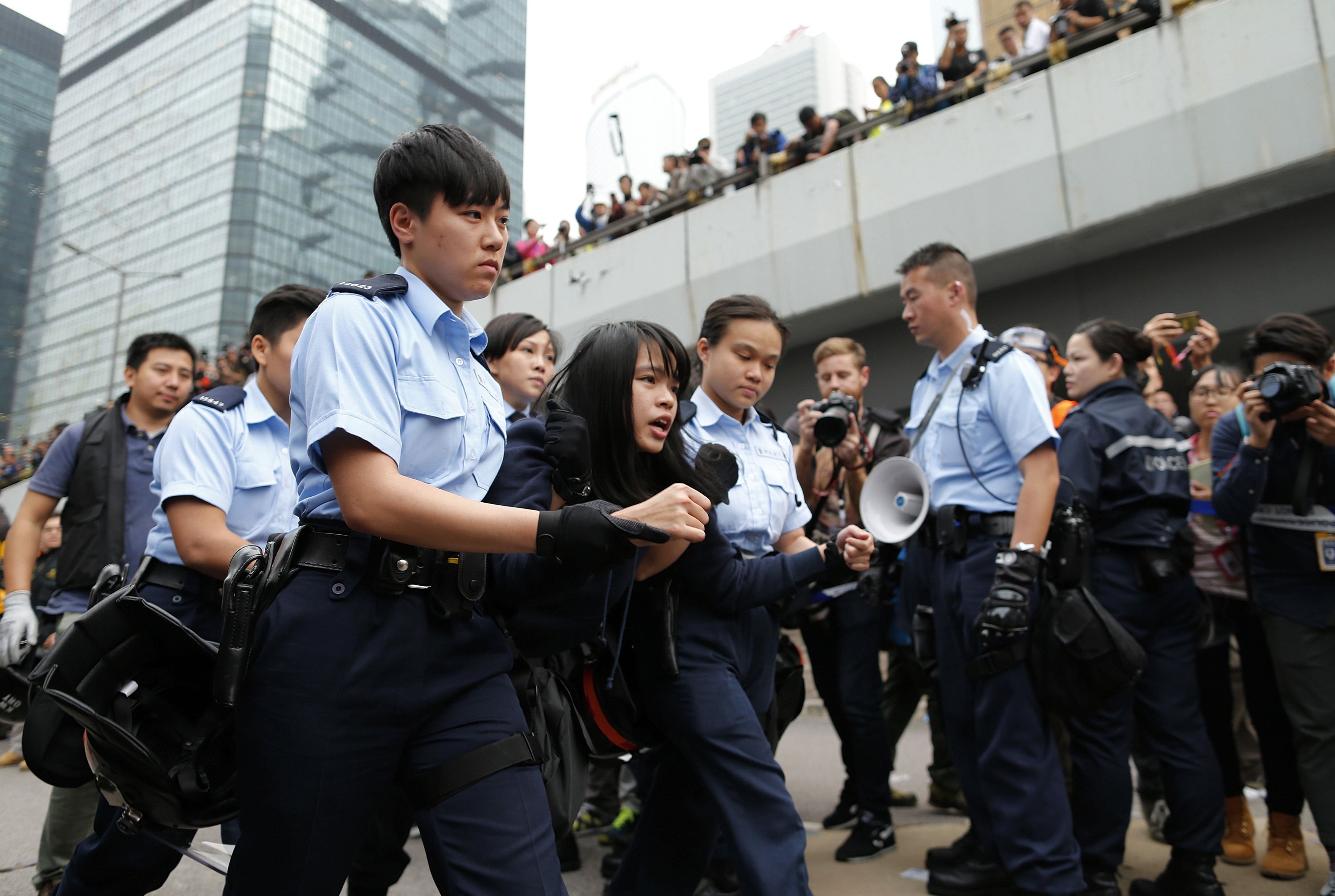Hong Kong Police Demolish Main Protest Camp Arrest 209 People Cbs News
