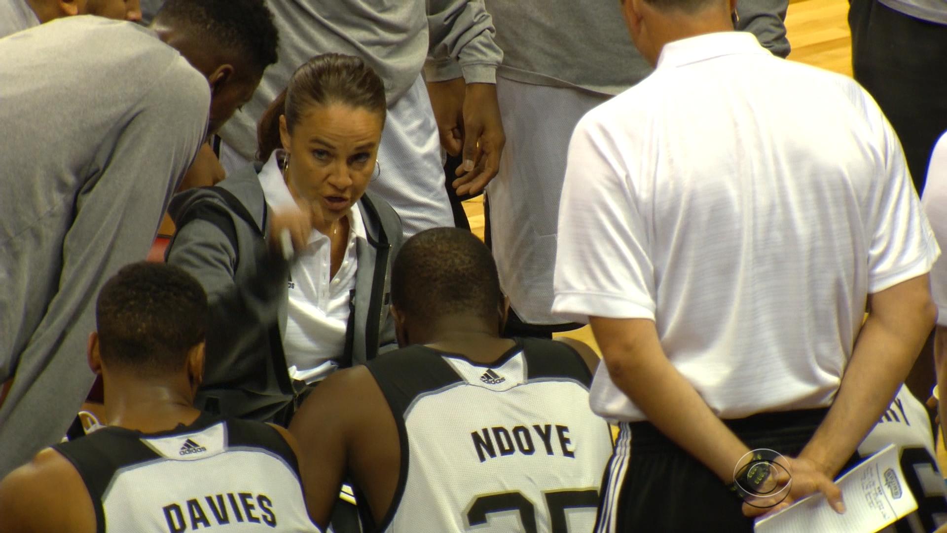 Female coach breaks glass ceiling in male dominated NBA - CBS News