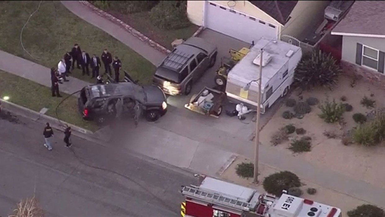 Homicide inquiry starts after 3 bodies found in burning SUV CBS News