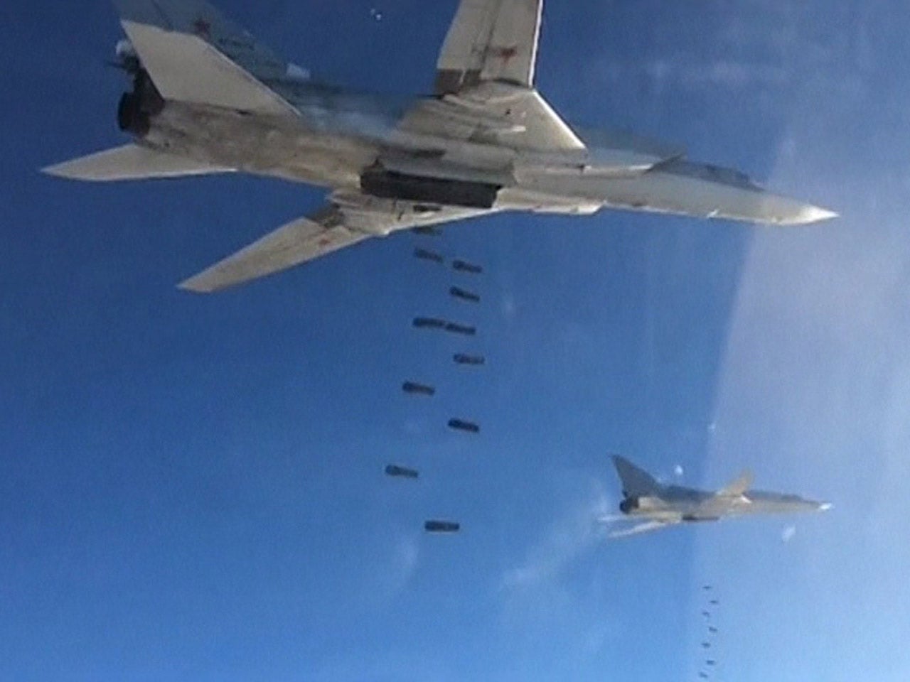 Russian airstrikes blast ISIS oil facilities in Syria - CBS News