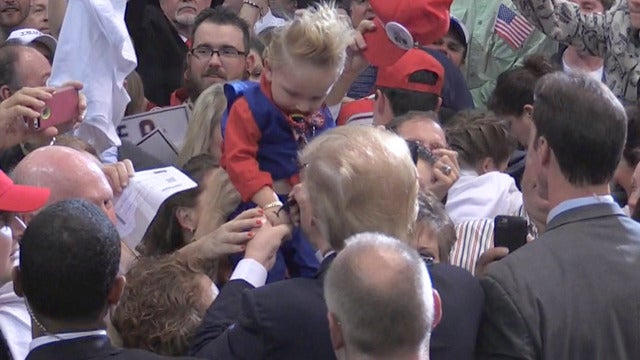 Donald Trump Autographs Crowdsurfing Baby At Campaign Rally - CBS News