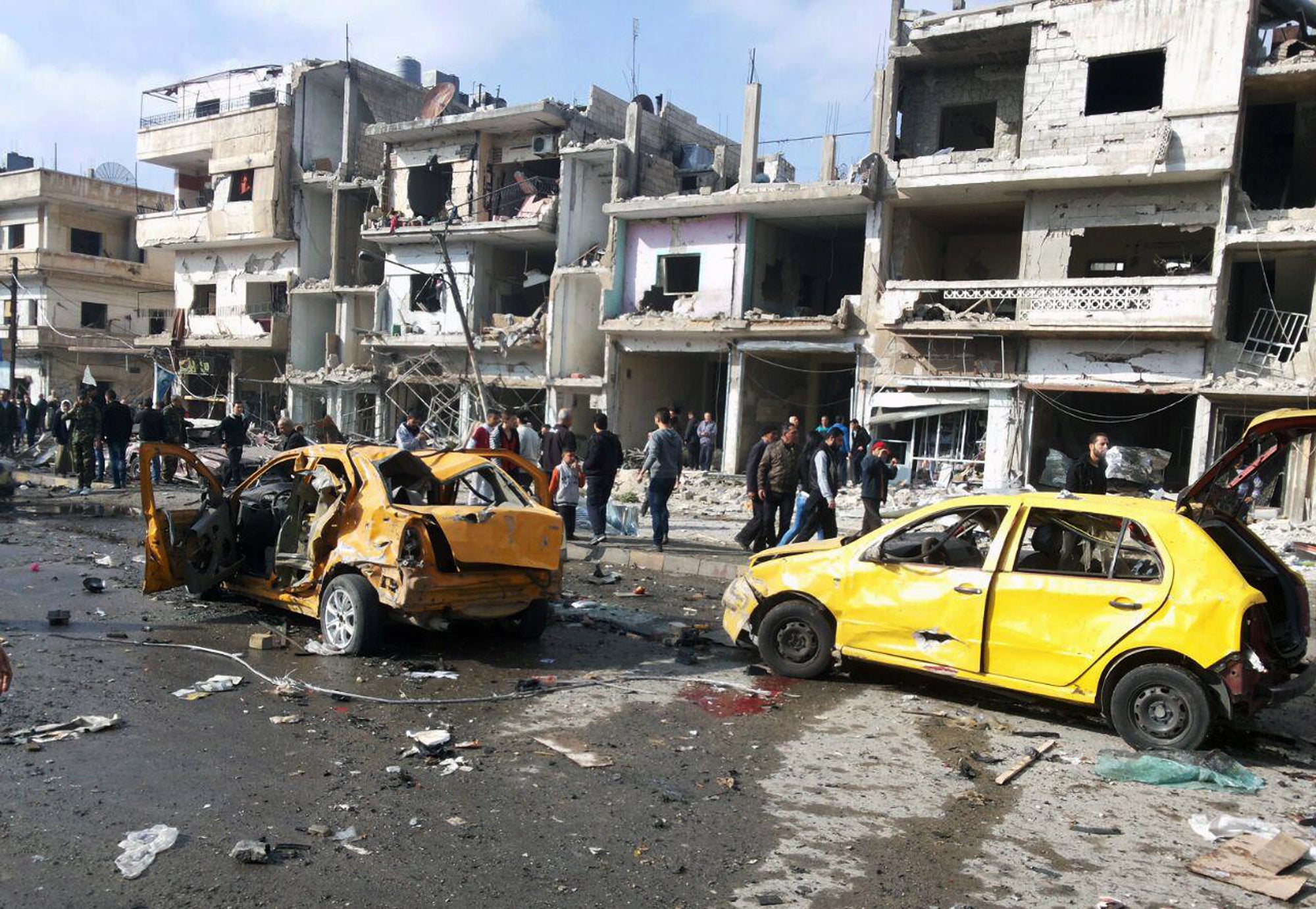 Nearly 130 people killed in series of bombings in Syria - CBS News