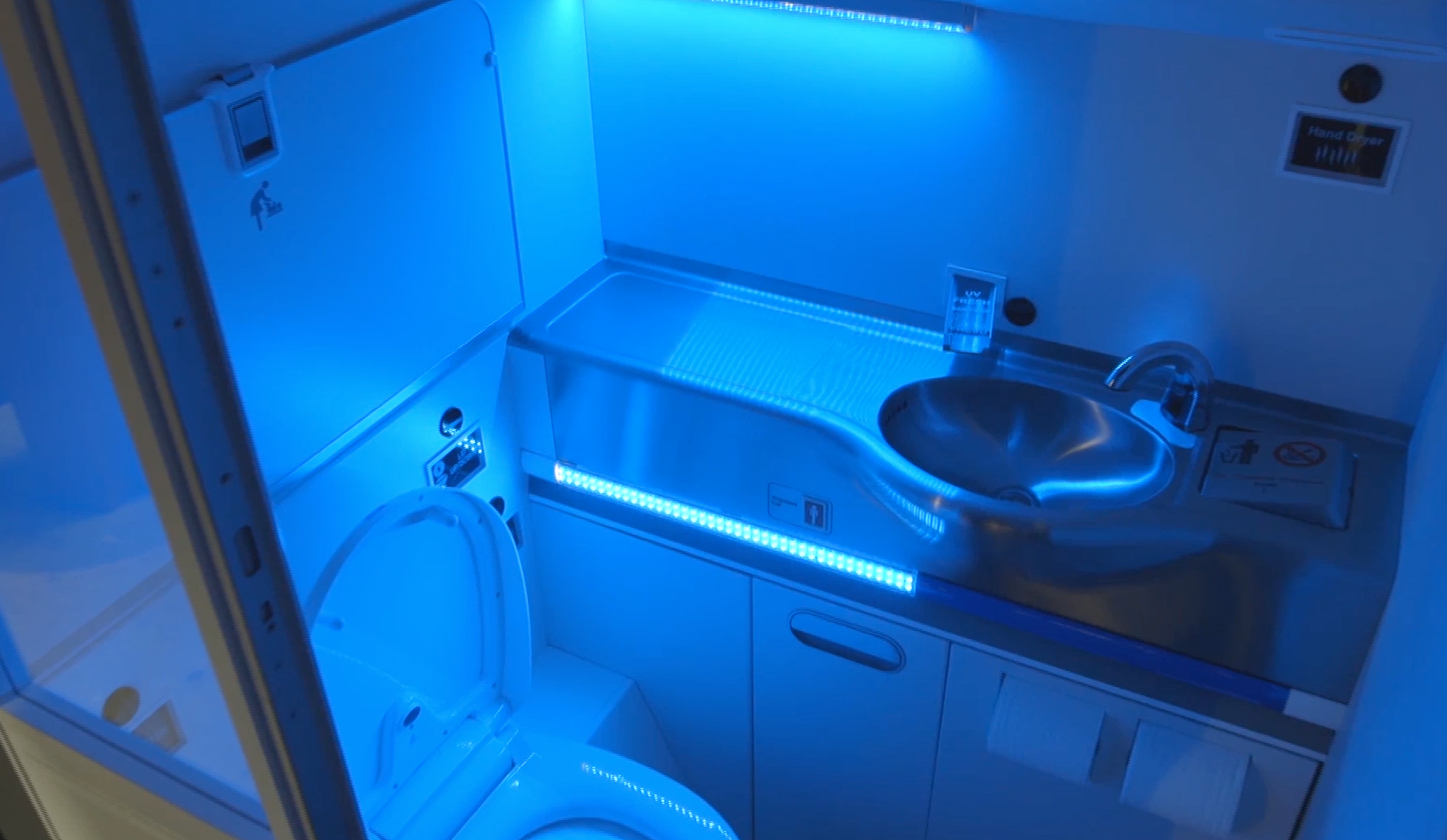 Boeing's self-cleaning lavatory zaps UV light - CBS News