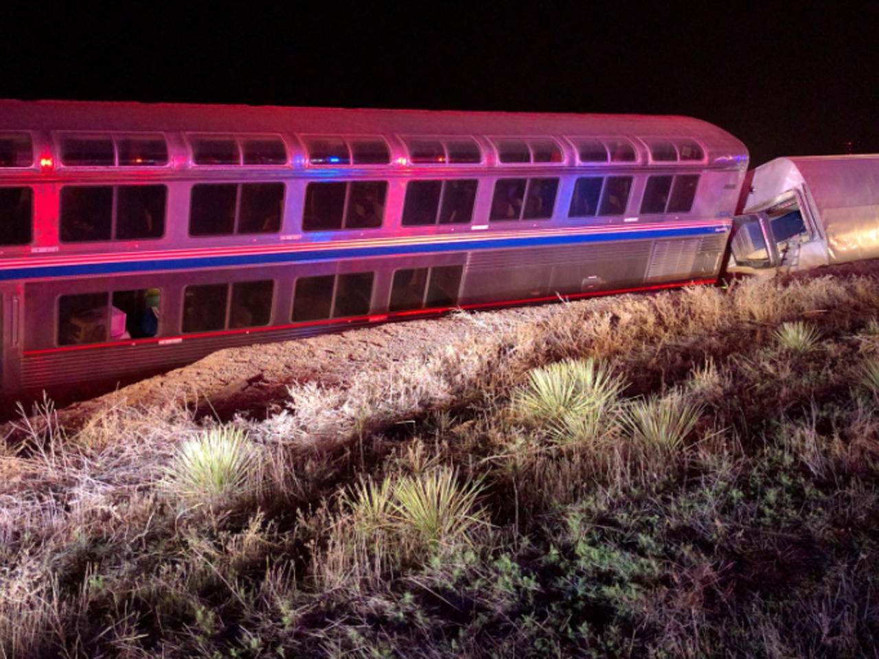 Amtrak sues Kansas feed yard over train derailment CBS News