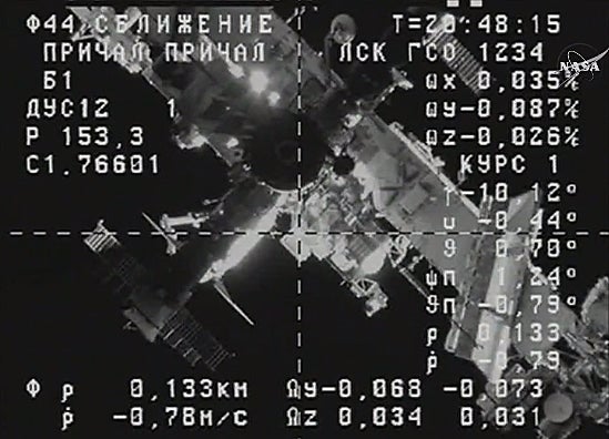 Russian Progress Cargo Ship Docks At Space Station - CBS News