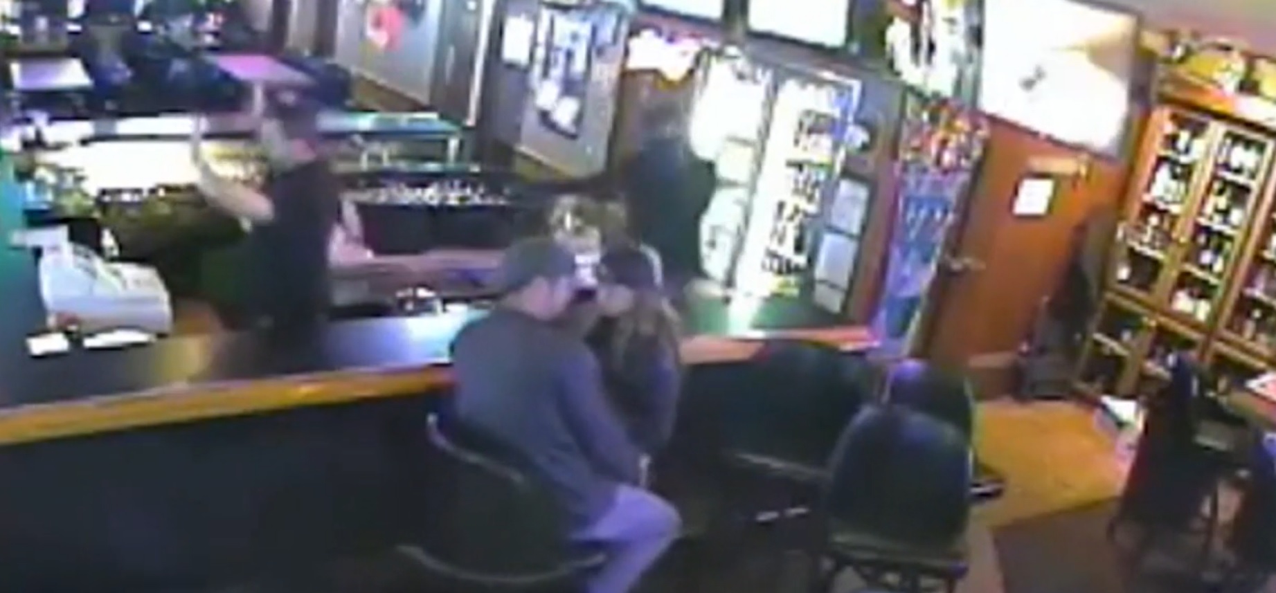 Seemingly Oblivious Couple Kisses During Bar Robbery Cbs News 5333
