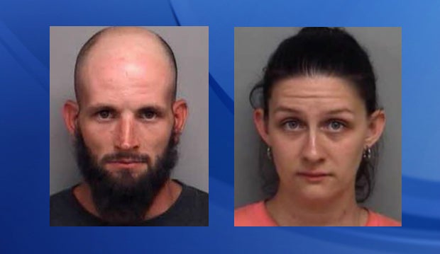 Parents arrested after missing toddler found in woods - CBS News